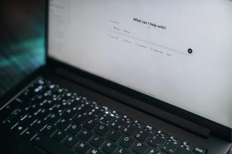 The Prompt Is the New Interface article cover: laptop with prompt-first AI UI
